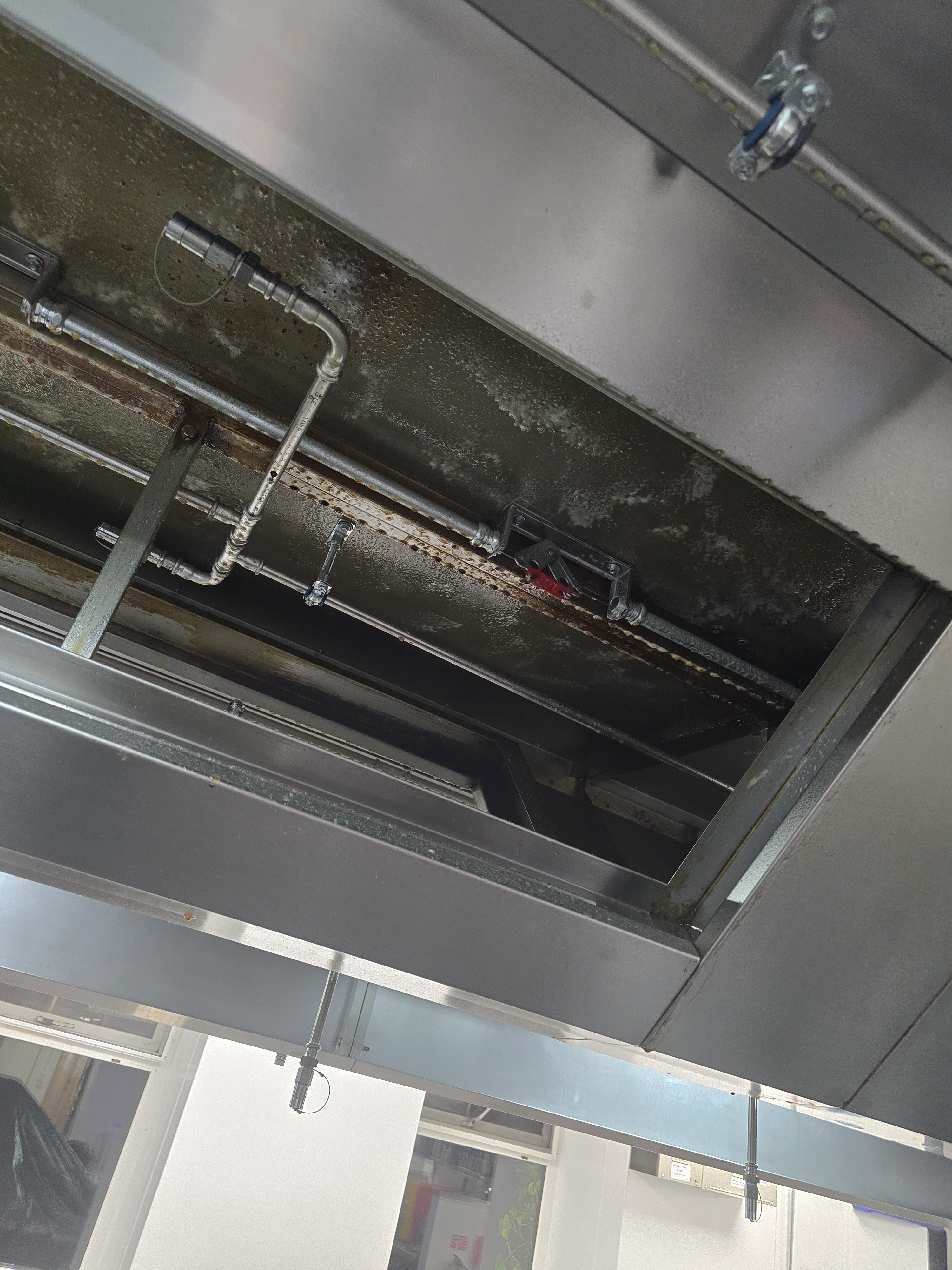 Canopy interior showing grease accumulation - before cleaning