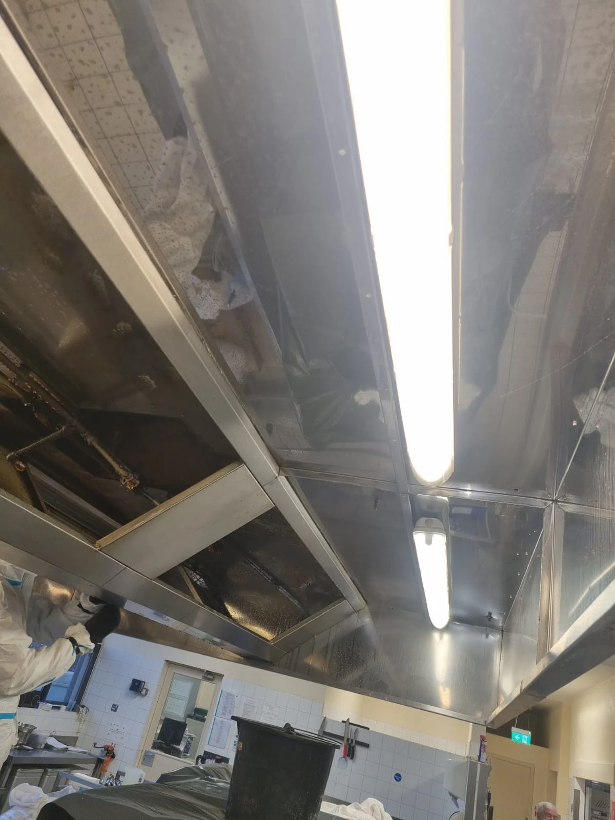 Canopy during cleaning process showing grease removal